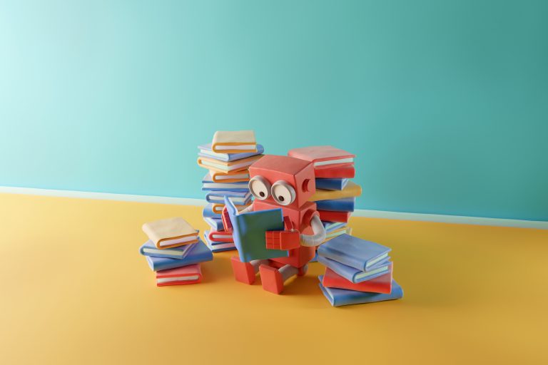 A little coral coloured robot sat reading amongst a pile of books