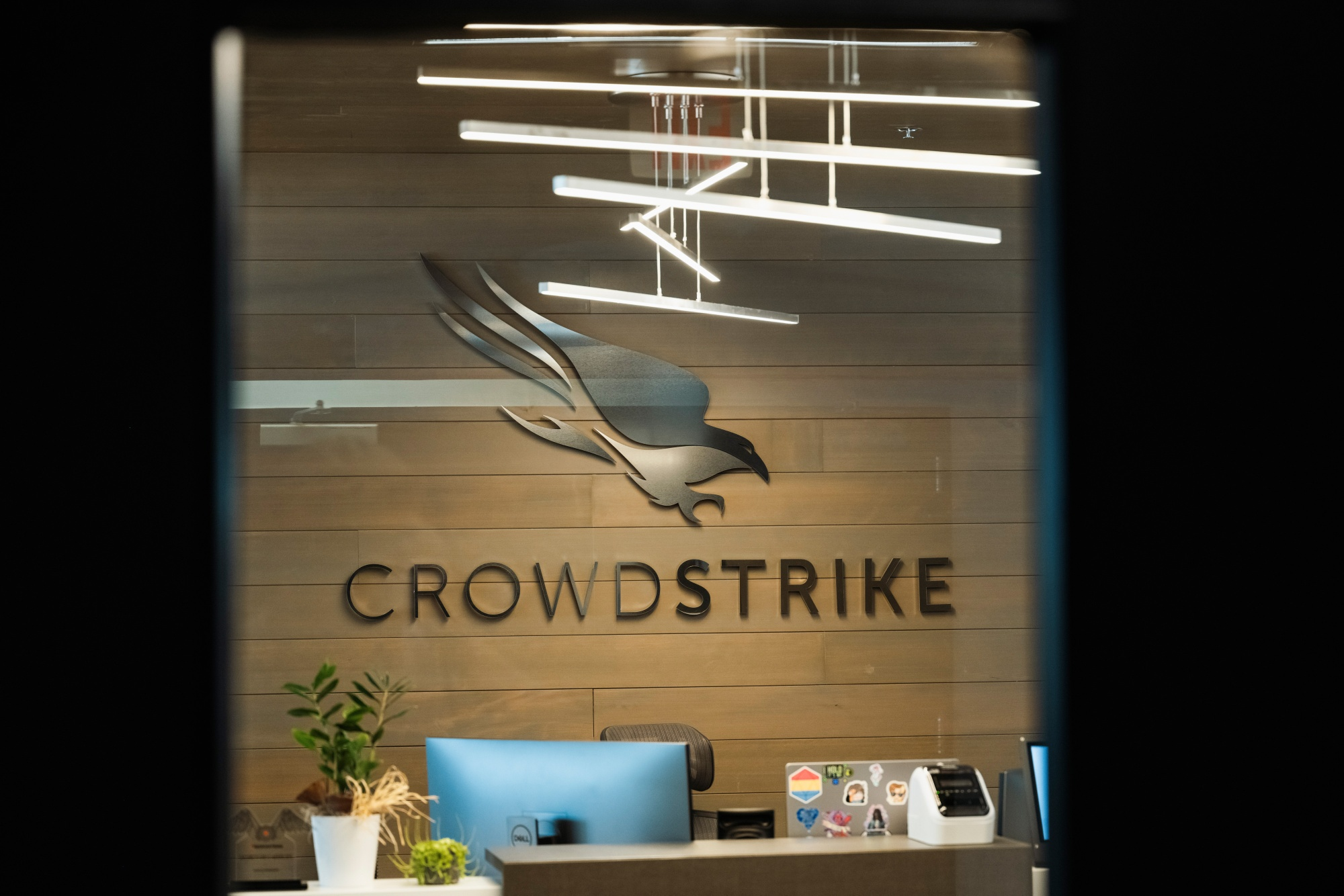 Crowdstrike logo against a office reception desk